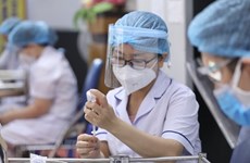 Le solide système de vaccination aide le Vietnam à se tenir ferme face au Covid-19