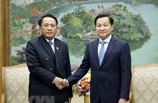 Le vice-PM Lê Minh Khai reçoit le ministre des Finances du Laos