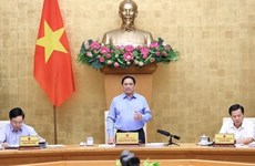 Le PM Pham Minh Chinh préside la réunion périodique du gouvernement sur l'édification de la loi