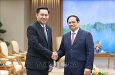 Le PM Pham Minh Chinh reçoit le ministre, président du Bureau du Premier ministre lao