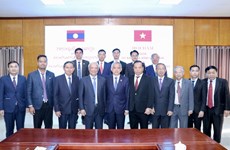 Promotion de la coopération entre les Comités pour la paix du Vietnam et du Laos