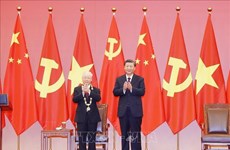 Le secrétaire général Nguyên Phu Trong reçoit l’Ordre de l’Amitié de la Chine
