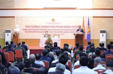 Le PM Pham Minh Chinh rencontre des expatriés vietnamiens au Cambodge