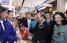 Le président Nguyên Xuân Phuc inaugure la Semaine des produits vietnamiens en Thaïlande 2022