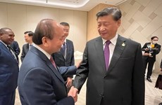 APEC: le président Nguyen Xuan Phuc rencontre le dirigeant chinois Xi Jinping