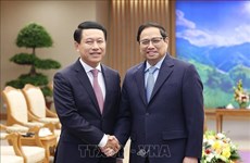 Le PM Pham Minh Chinh reçoit le vice-PM et ministre des Affaires étrangères du Laos