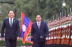 La presse lao couvre la visite officielle au Laos du PM Pham Minh Chinh