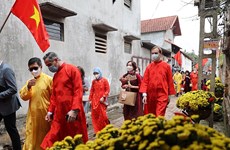 Les étrangers au Vietnam fêtent le Têt du Chat 2023