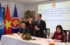 Le vice-Premier ministre Tran Luu Quang rencontre des Vietnamiens en Suisse