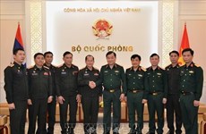 Le général de corps d'armée Hoang Xuan Chien reçoit la délégation du département de chimie du Laos
