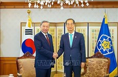 Le ministre de la Sécurité publique Tô Lâm rencontre le PM sud-coréen Han Duck-soo