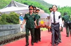 Thanh Hoa : Inhumation de restes de soldats volontaires et experts vietnamiens tombés au Laos
