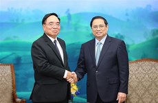 Le PM Pham Minh Chinh reçoit le ministre lao du Plan et de l'Investissement