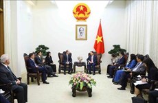 Le vice-PM Le Minh Khai reçoit le président du groupe ANZ