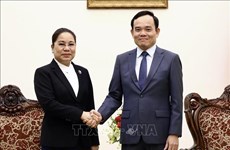 Le vice-PM Trân Luu Quang exhorte à booster la coopération touristique Vietnam-Laos