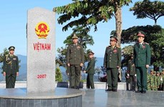 Le premier échange d'amitié de la défense frontalière Vietnam-Laos-Cambodge