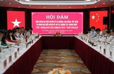 Promouvoir la coopération entre des districts vietnamien et chinois