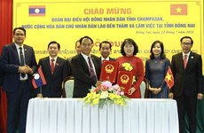 Dong Nai et Champasak échangent des expériences dans les activités du Conseil populaire