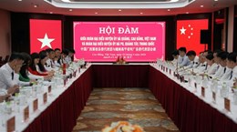 Promouvoir la coopération entre des districts vietnamien et chinois