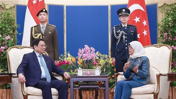 Le PM Pham Minh Chinh rencontre la présidente Halimah Yacob