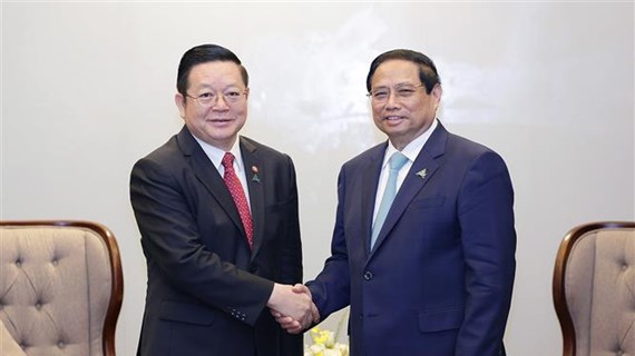 Le Premier ministre Pham Minh Chinh reçoit le secrétaire général de l'ASEAN