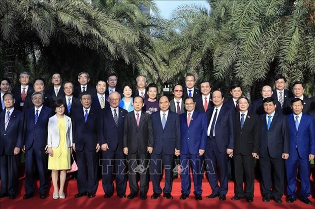Le PM Nguyen Xuan Phuc recoit le secretaire general Parti liberal-democrate japonais hinh anh 1