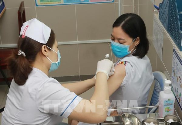 COVID-19 : Ho Chi Minh-Ville effectue la deuxieme phase de vaccination hinh anh 1