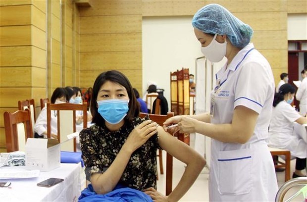 Le Vietnam accelere la vaccination contre le COVID-19 hinh anh 1