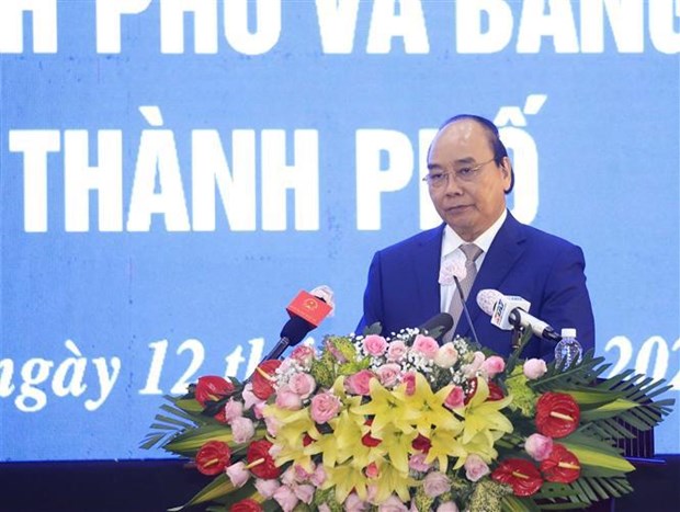 Le president remet l’Ordre du travail au district de Cu Chi a Ho Chi Minh-Ville hinh anh 1