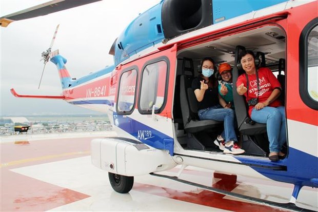 Ho Chi Minh-Ville: visite touristique de la ville en helicoptere hinh anh 3
