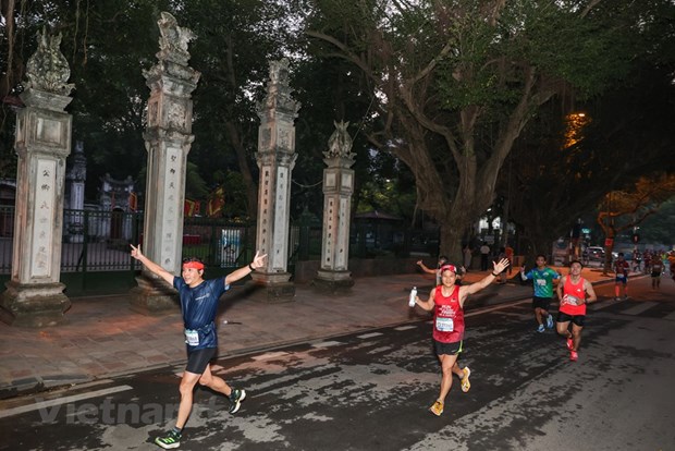 Plus de 10.000 coureurs dans les rues de la capitale pour le VPBank Hanoi Marathon 2022 hinh anh 6