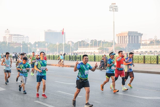 Plus de 10.000 coureurs dans les rues de la capitale pour le VPBank Hanoi Marathon 2022 hinh anh 7