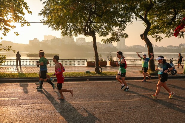 Plus de 10.000 coureurs dans les rues de la capitale pour le VPBank Hanoi Marathon 2022 hinh anh 9