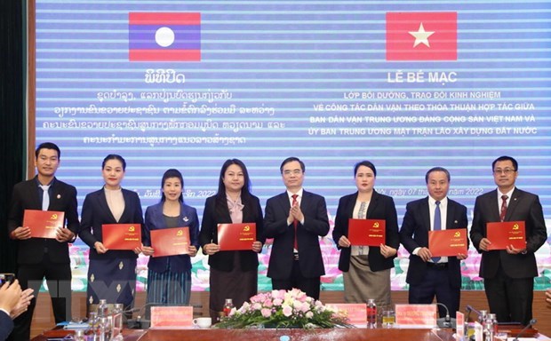 Vietnam et Laos partagent d'experiences liees a la mobilisation des masses hinh anh 1