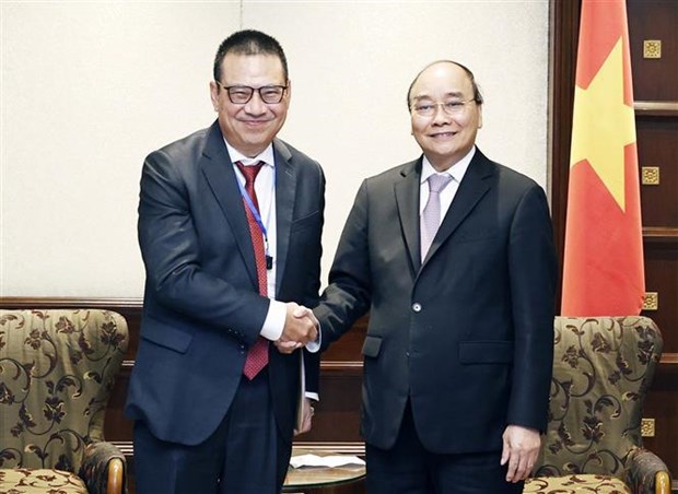 Le president Nguyen Xuan Phuc rencontre des dirigeants de grandes entreprises thailandaises hinh anh 1
