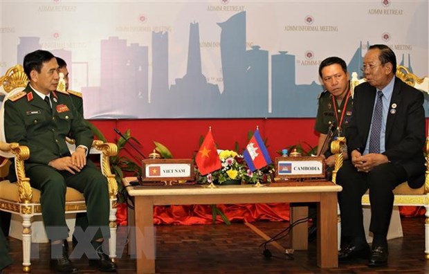 Le ministre vietnamien de la Defense rencontre ses homologues cambodgien et chinois hinh anh 1