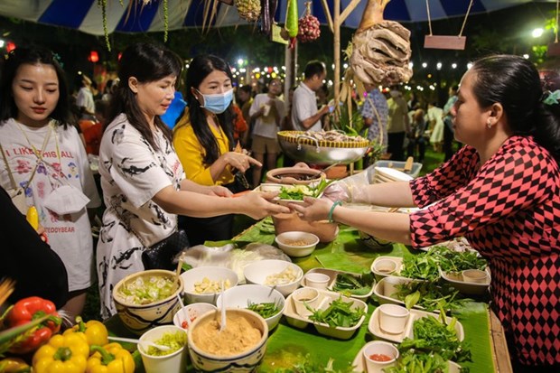 Ho Chi Minh-Ville exploite le potentiel des rues gastronomiques pour seduire les touristes hinh anh 2