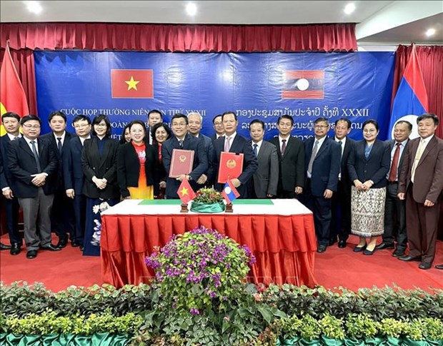 La 32e reunion entre les delegations frontalieres vietnamienne et lao hinh anh 1