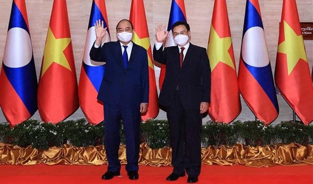 La presse lao publie plusieurs articles sur la visite d'amitie officielle du president vietnamien hinh anh 1