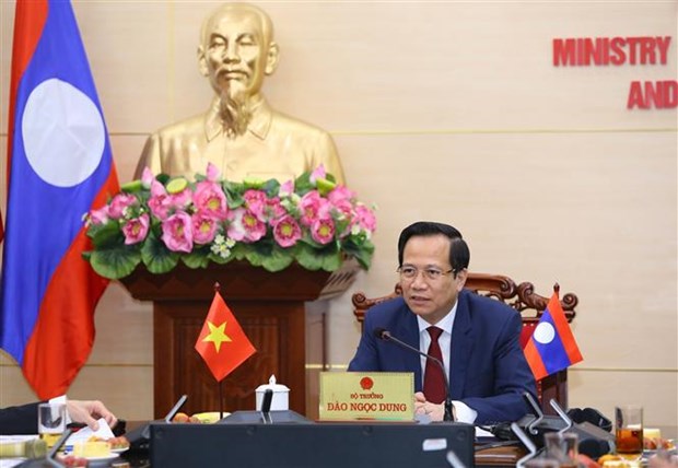 Vietnam-Laos renforcent leur cooperation dans le domaine du travail et du bien-etre social ​ hinh anh 1