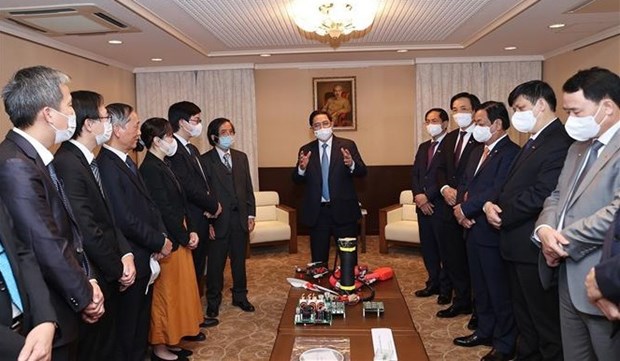 Le PM Pham Minh Chinh rencontre des representants d'intellectuels vietnamiens au Japon hinh anh 1