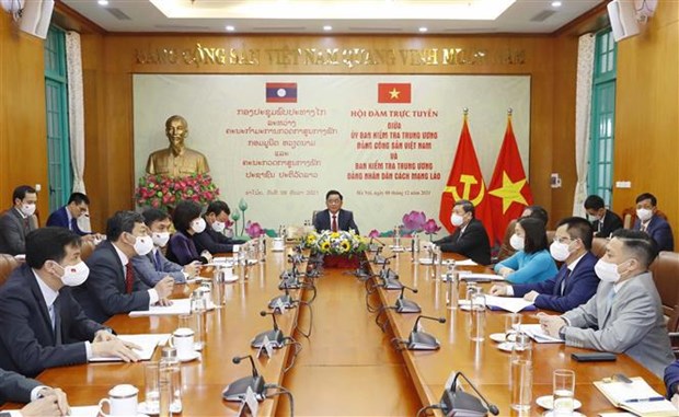 Vietnam-Laos: entretien en ligne entre les Commissions centrales de controle du PCV et du PPRL hinh anh 1