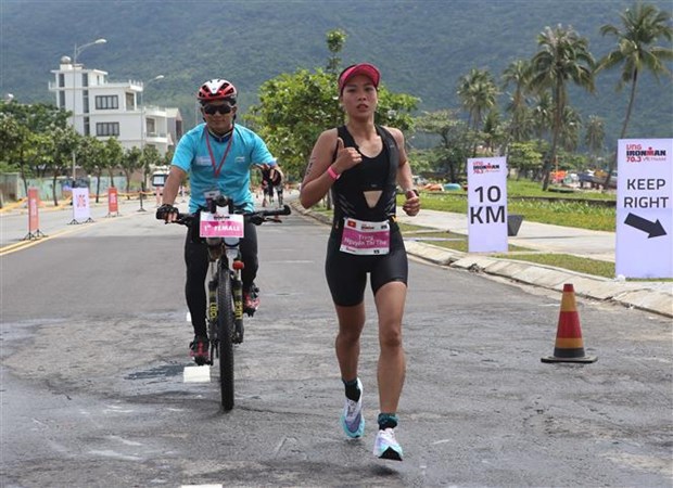 Une Vietnamienne remporte un premier prix au tournoi Ironman 70.3 Vietnam 2022 hinh anh 3