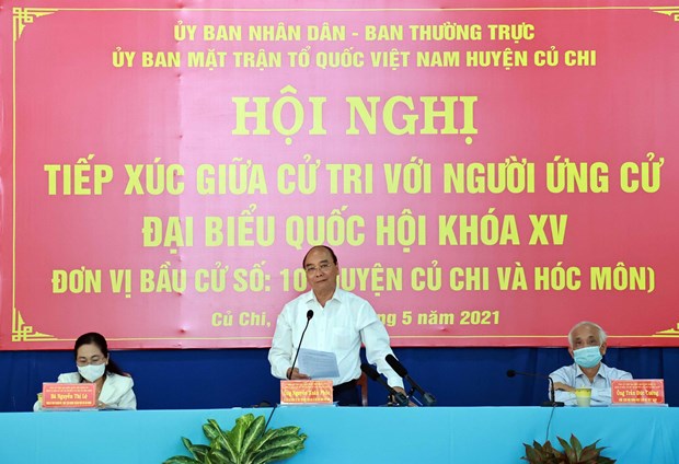Le president Nguyen Xuan Phuc rencontre des electeurs de Ho Chi Minh-Ville hinh anh 1