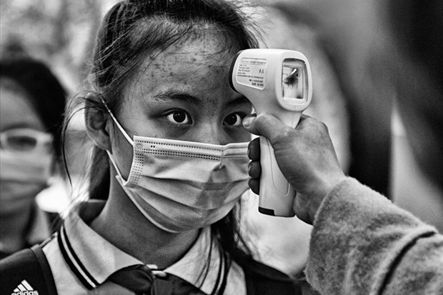 Des photographes vietnamiens honores a un concours international de photojournalisme d'Espagne hinh anh 1
