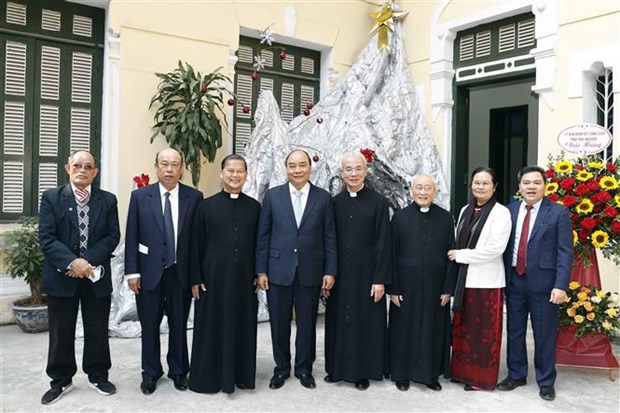 Le president Nguyen Xuan Phuc formule ses vœux de Noel aux catholiques hinh anh 1
