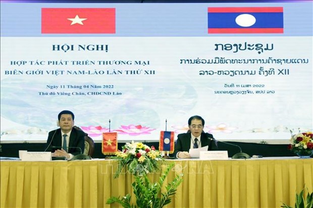 Le Vietnam et le Laos s’engagent a booster leur commerce frontalier hinh anh 1