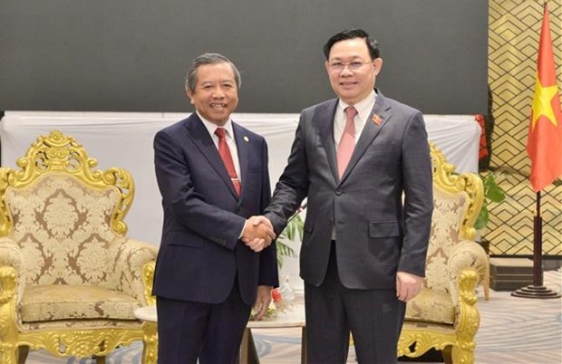 Vuong Dinh Hue rencontre le ministre lao des Telecommunications et de la Communication hinh anh 1
