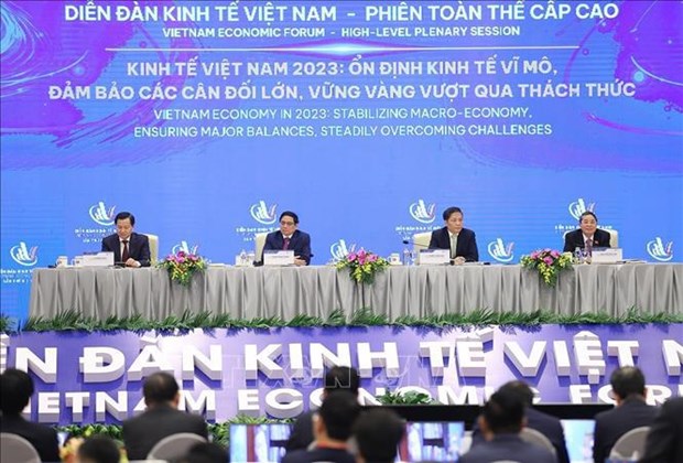 Le PM Pham Minh Chinh preside la session pleniere du 5e Forum economique du Vietnam hinh anh 1