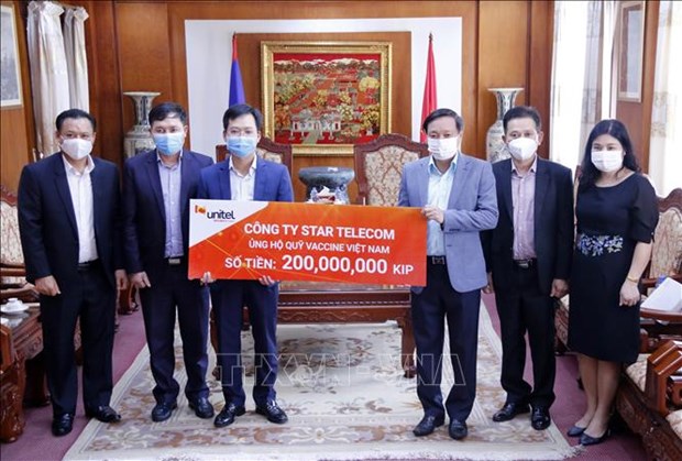 Une coentreprise Vietnam-Laos soutient le Fonds de vaccins contre le COVID-19 hinh anh 1